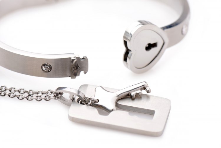 cuffed locking bracelet and key necklace 